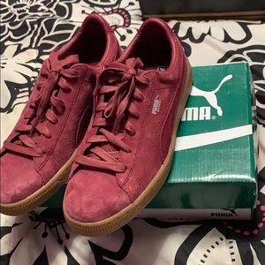 Burgundy pumas